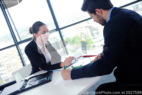 Image of business people group in a meeting at office