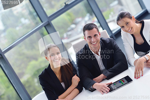 Image of business people group in a meeting at office