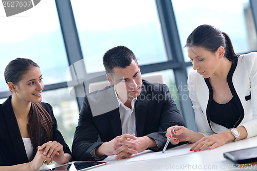 Image of business people group in a meeting at office