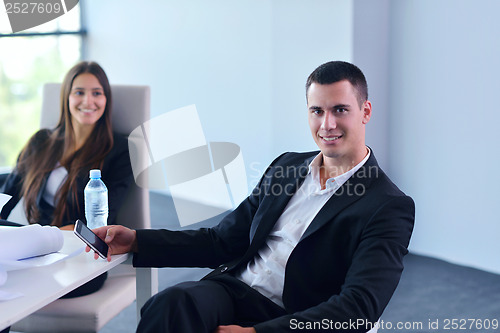 Image of business people group in a meeting at office