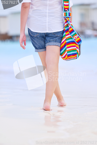 Image of beautiful woman on beach have fun and relax