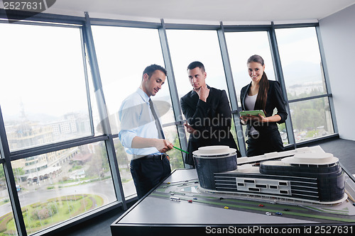 Image of business people group in a meeting at office