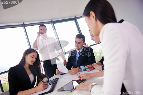 Image of business people group in a meeting at office