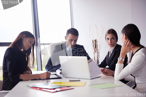 Image of business people group in a meeting at office