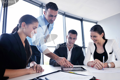 Image of business people group in a meeting at office