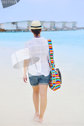 Image of beautiful woman on beach have fun and relax