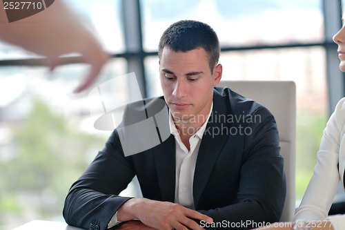 Image of business people group in a meeting at office