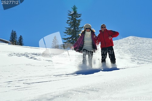 Image of young couple on winter vacation