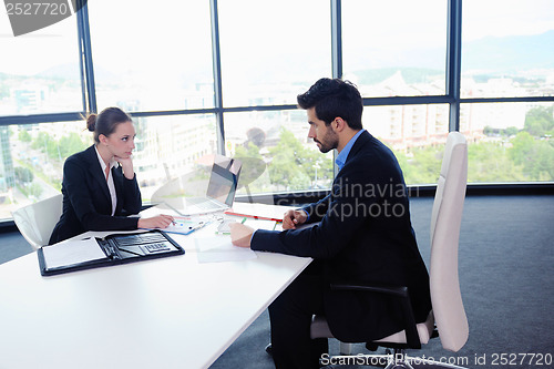 Image of business people group in a meeting at office