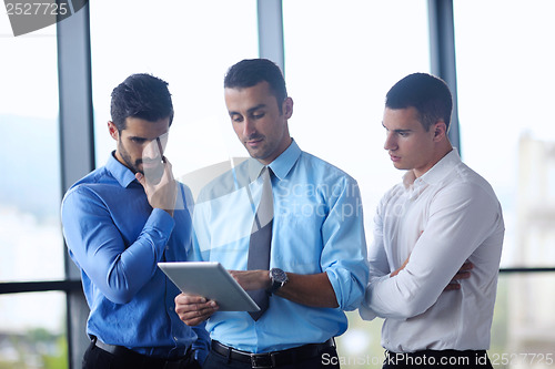 Image of business people group in a meeting at office