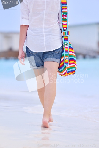 Image of beautiful woman on beach have fun and relax