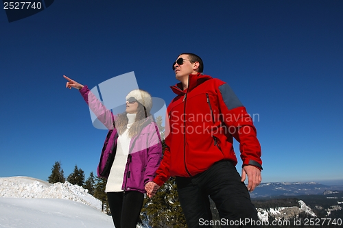 Image of young couple on winter vacation