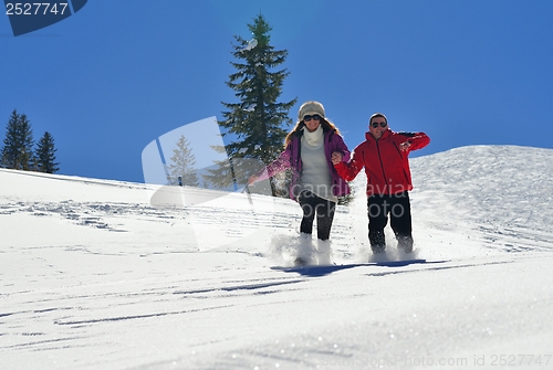 Image of young couple on winter vacation