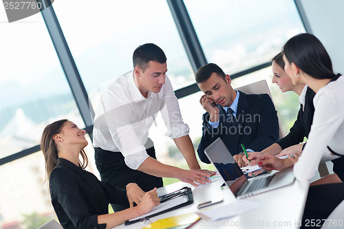 Image of business people group in a meeting at office