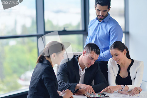 Image of business people group in a meeting at office