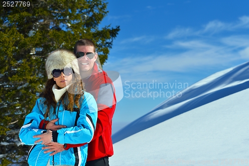 Image of young couple on winter vacation