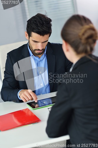 Image of business people group in a meeting at office