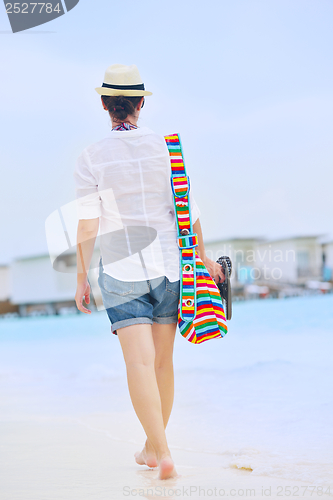 Image of beautiful woman on beach have fun and relax