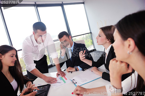 Image of business people group in a meeting at office