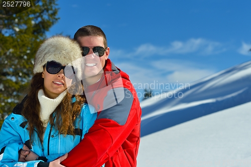 Image of young couple on winter vacation