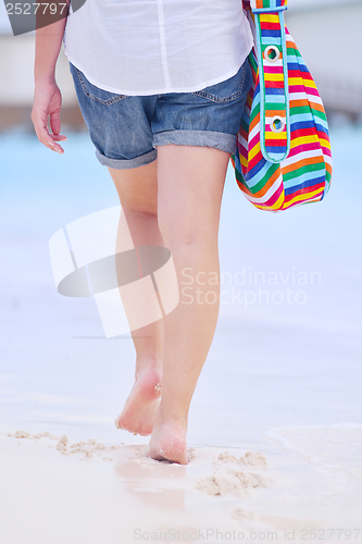 Image of beautiful woman on beach have fun and relax