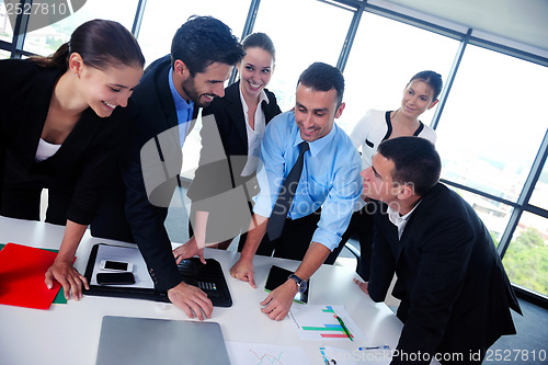 Image of business people group in a meeting at office