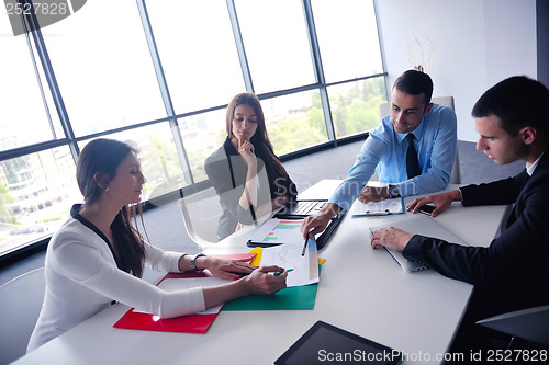 Image of business people group in a meeting at office