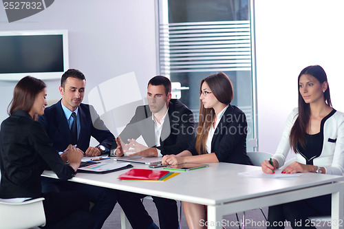 Image of business people group in a meeting at office