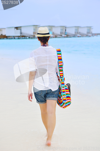 Image of beautiful woman on beach have fun and relax