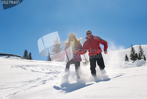 Image of young couple on winter vacation