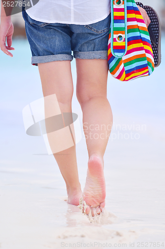 Image of beautiful woman on beach have fun and relax