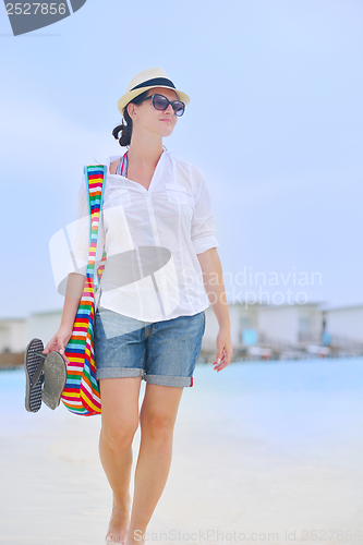 Image of beautiful woman on beach have fun and relax