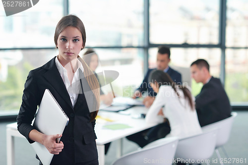 Image of business people group in a meeting at office