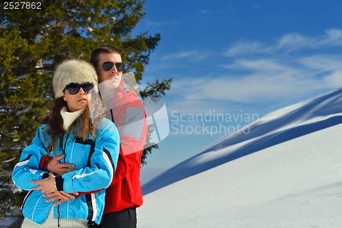 Image of young couple on winter vacation