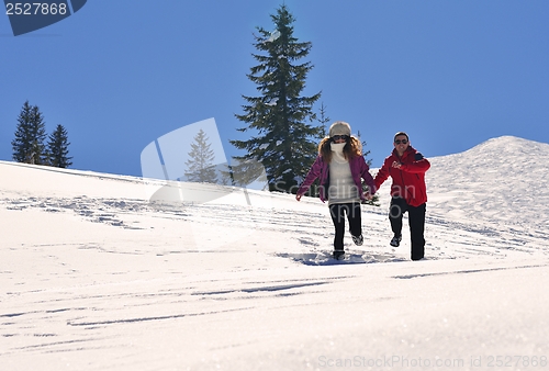 Image of young couple on winter vacation