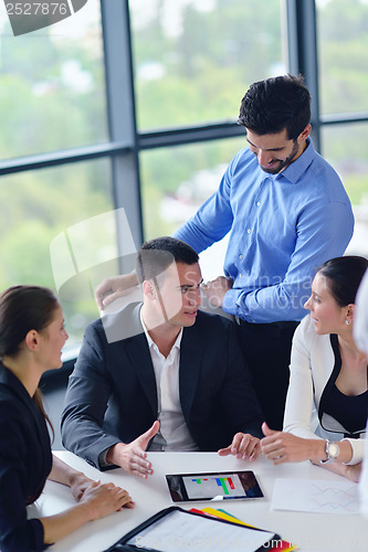 Image of business people group in a meeting at office