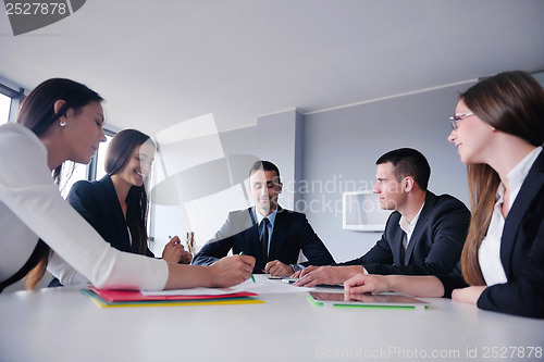 Image of business people group in a meeting at office