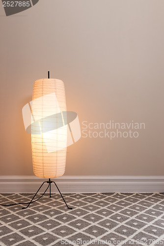 Image of Cozy lamp in empty room