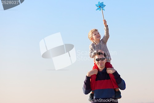 Image of family with pinwheel