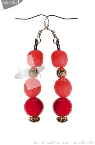 Image of Earrings of red beads with gold elements on a white background