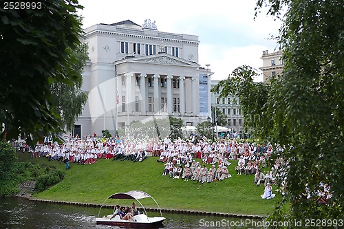 Image of RIGA, LATVIA - JULY 06: People in national costumes at the Latvi