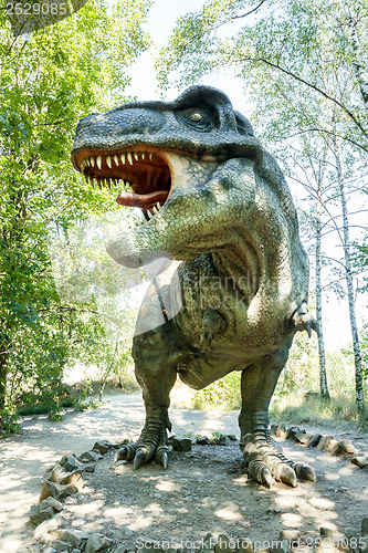 Image of model of big tyranosaurus rex jungle