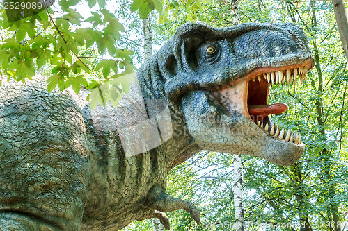 Image of model of big tyranosaurus rex jungle