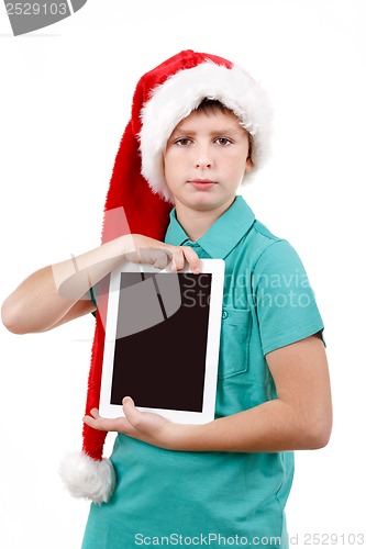 Image of teenage boy with santa claus hat