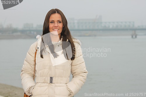 Image of Lady by the river