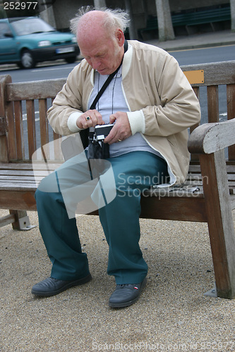 Image of man with his camera