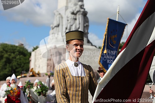 Image of RIGA, LATVIA - JULY 07: People in national costumes at the Latvi