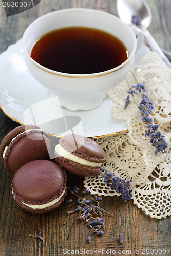 Image of Macarons and sprigs of lavender. 