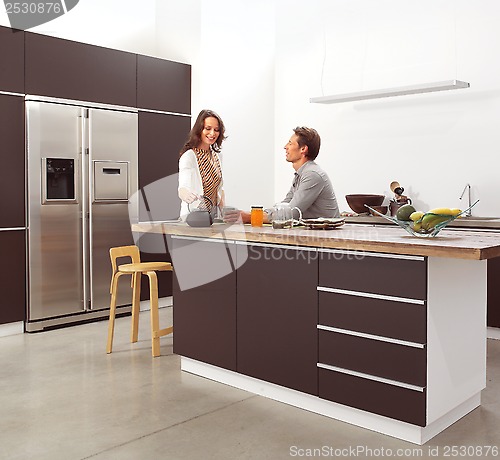 Image of couple in the modern kitchen