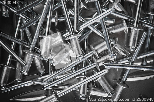 Image of Aluminium assembly rivets, close up